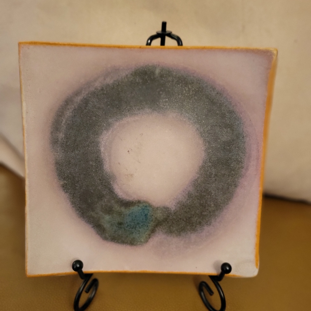 Decorative ceramic plate with emso design.